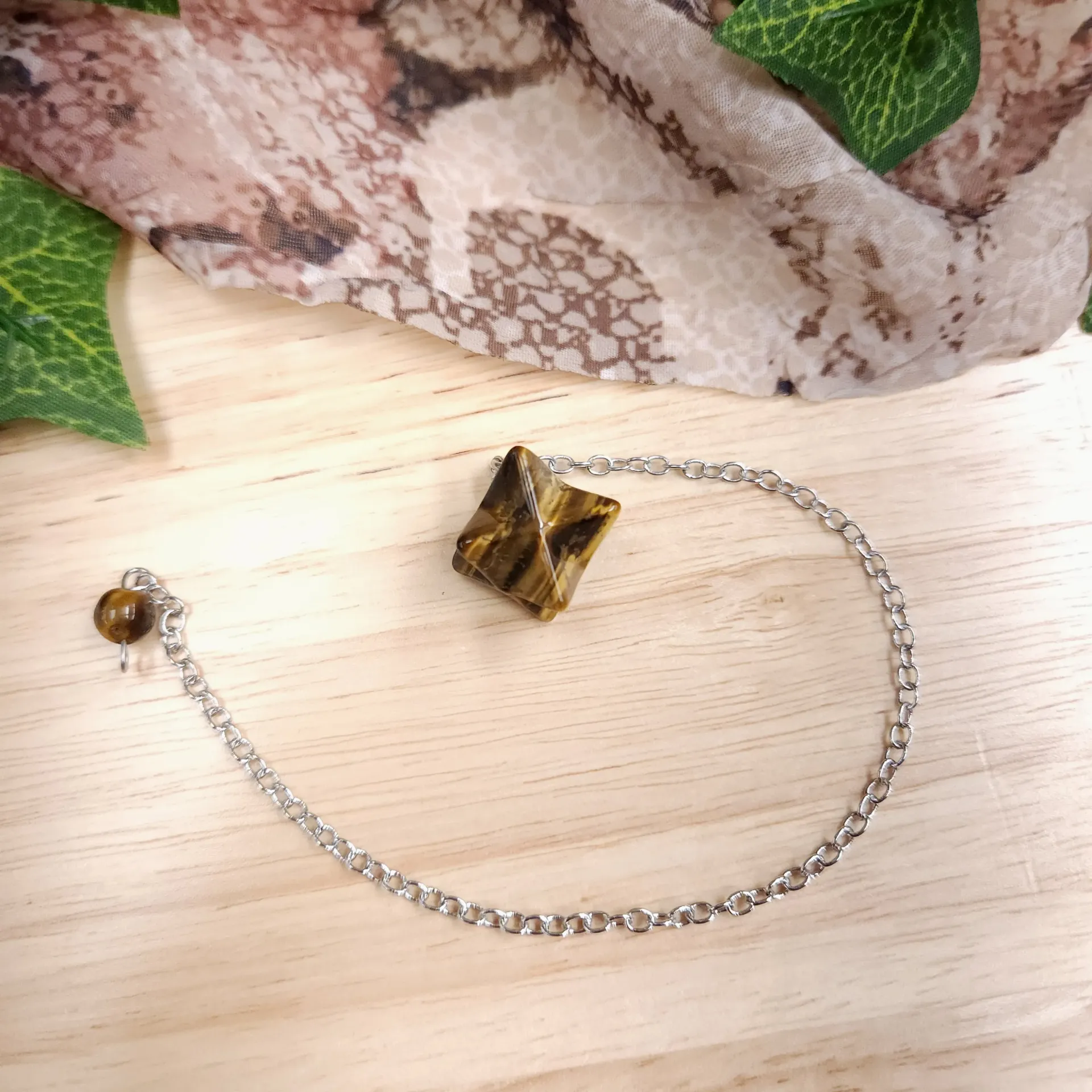 [103650] Tiger's Eye Merkaba Pendulum – Star Tetrahedron, Matching Stone Grip