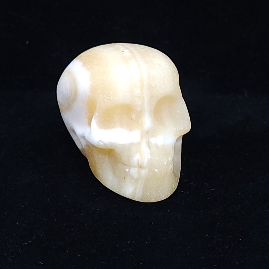 [10952] Orange Calcite Skull (S)